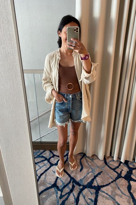 Vacation outfit. Cruise outfit. Beach outfit. Pool outfit. One-piece swimsuit. Swimsuit coverup. Denim shorts. Flip-flop sandals. Flip-flops  
Sling bag

#LTKfindsunder100 #LTKover40 #LTKswim