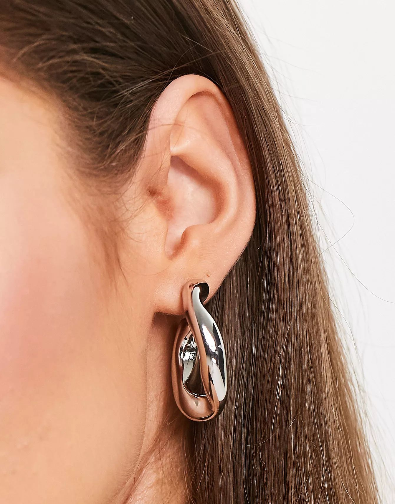 ASOS DESIGN hoop earring with twist link design in silver tone | ASOS (Global)