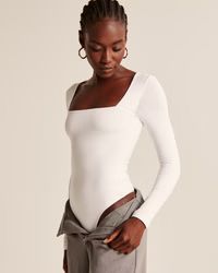 Women's Long-Sleeve Cotton Seamless Fabric Squareneck Bodysuit | Women's Tops | Abercrombie.com | Abercrombie & Fitch (US)