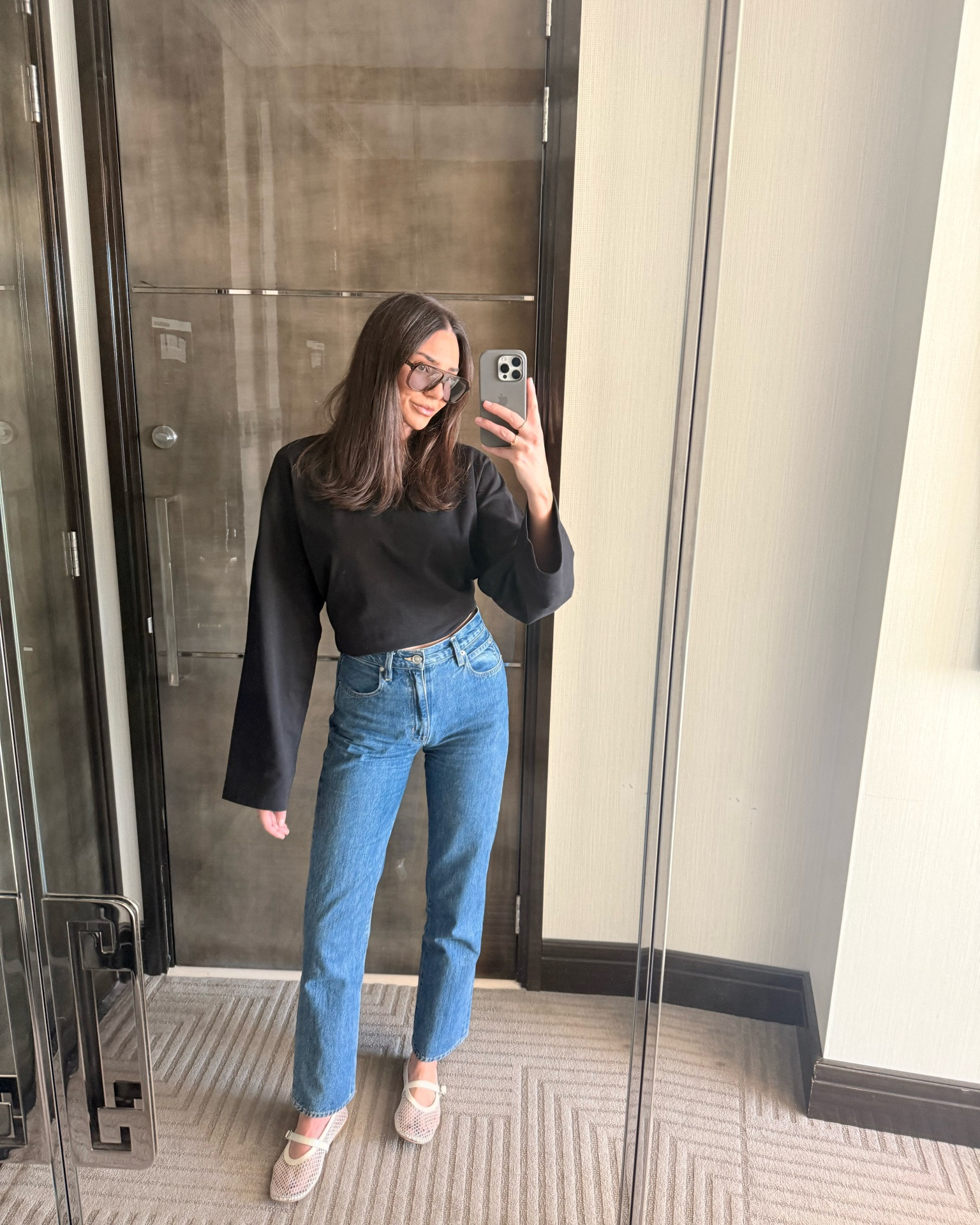 My go-to outfit 

Black long sleeve top with exaggerated sleeves 
High waisted straight leg denim 
White mesh ballet flats 
Oversized sunglasses

#LTKautumn #LTKstyletip #LTKaustralia