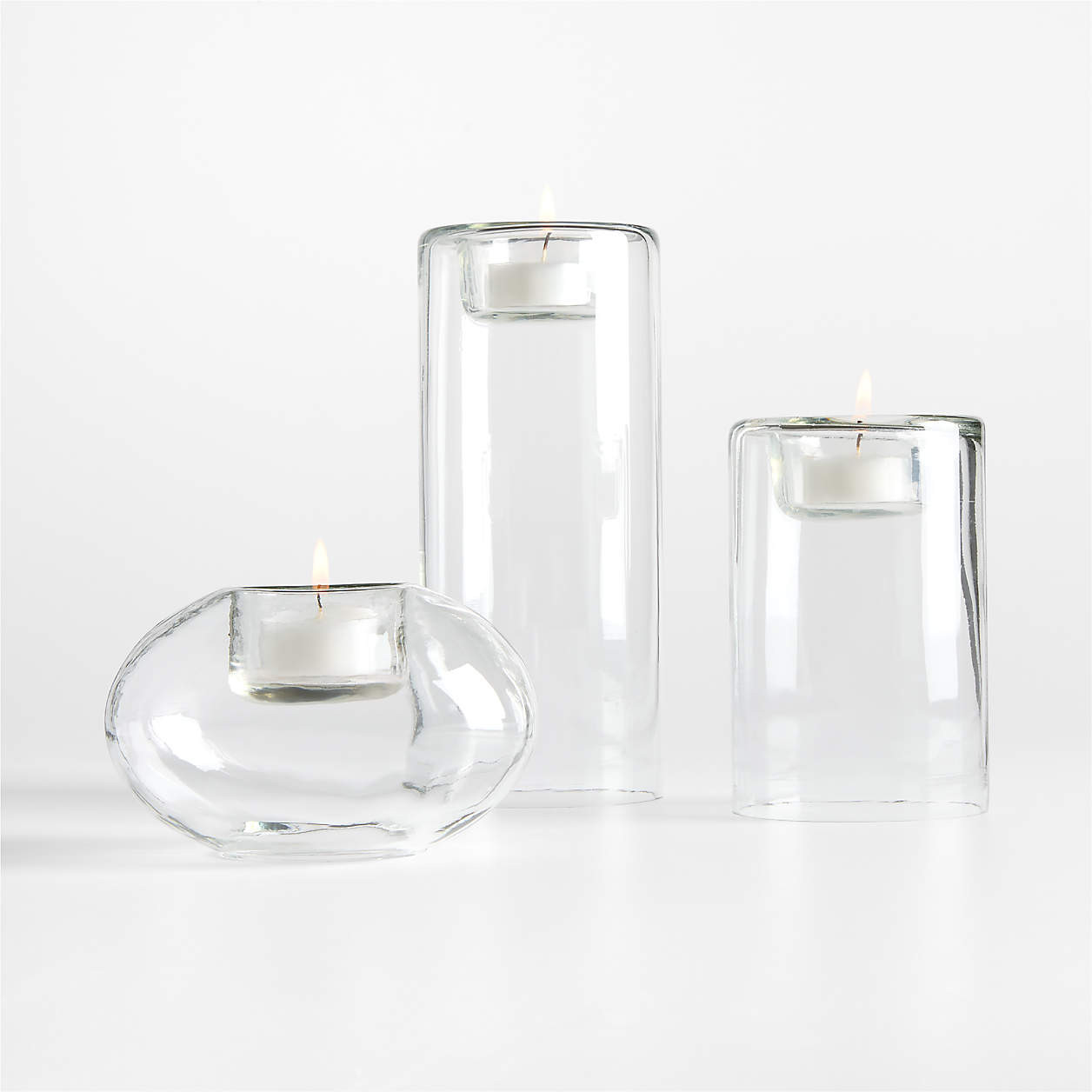 Roche Small Clear Glass Round Tealight Candle Holder 3.5" | Crate & Barrel | Crate & Barrel