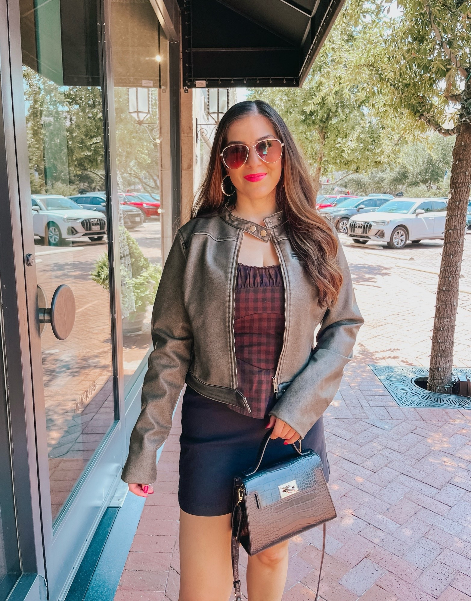 Super fun early fall outfit 🖤🤎 The faux leather jacket is a green grey color. Paired with a check patterned corset style top and black mini skirt all from Target Style!

#LTKSeasonal #LTKootd