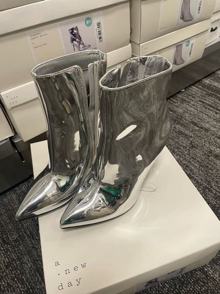 Silver ankle boots
3.25in stiletto heels
Pointed toes
Side zipper

#LTKfindsunder50 #LTKshoecrush #LTKHoliday