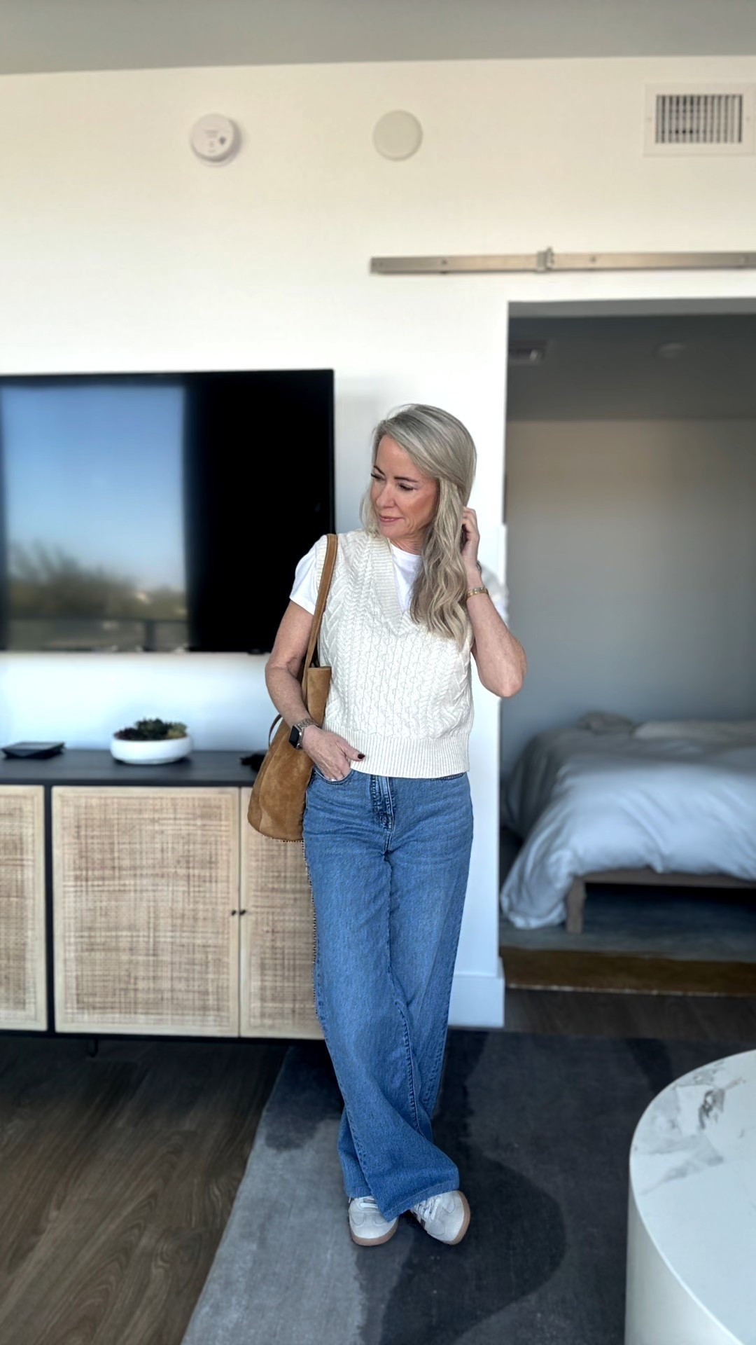 Weekend uniform: relaxed, effortless, and quietly polished. 🤍
Layer a textured knit vest over your favorite white tee and add wide-leg denim for that easy off-duty vibe. Sneakers and a suede bag keep it modern yet classic.

Shop the look:
▫️Knit vest xs
▫️White tee xs
▫️Wide-leg denim 24
▫️Neutral sneakers
▫️Suede shoulder bag

#LTKstyle #LTKFall #QuietLuxury #CityChicStyle #EffortlessOutfits

#LTKOver40 #LTKFindsUnder100 #LTKStyleTip #LTKOver40