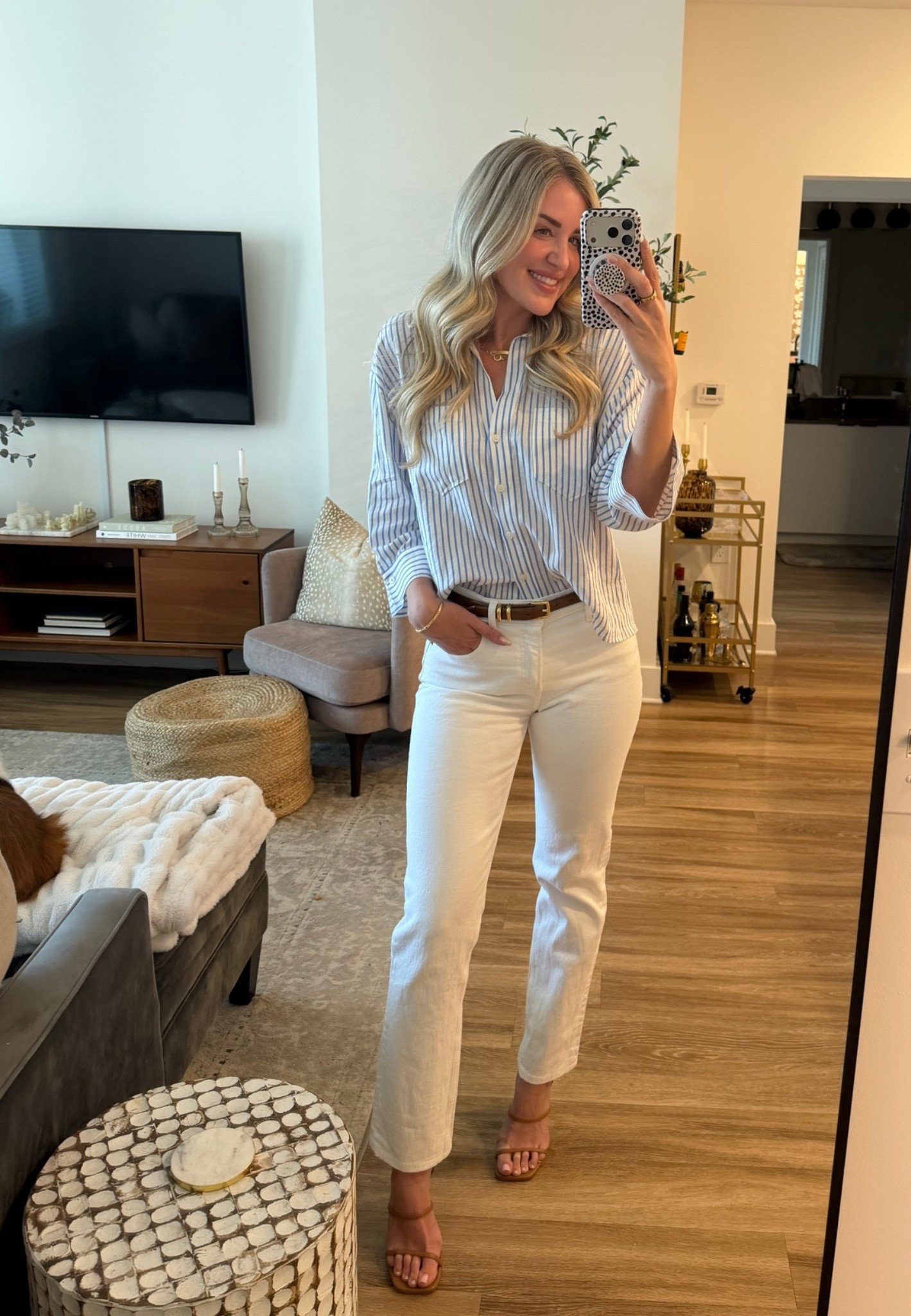 Obsessed with this oversized cropped button up! 
Shirt - XS 
Jeans - 26R 
Belt - XS
Shoes - TTS
My white jeans are the “high rise 90’s straight leg” fit but they don’t seem to have them in white anymore. I’ve linked several similar styles I can also vouch for! 

#springoutfit #workwear

#LTKootd #LTKWorkwear #LTKdayinmylife