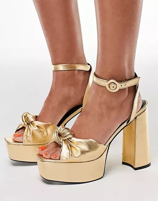 ASOS DESIGN Note knotted platform heeled sandals in gold | ASOS (Global)