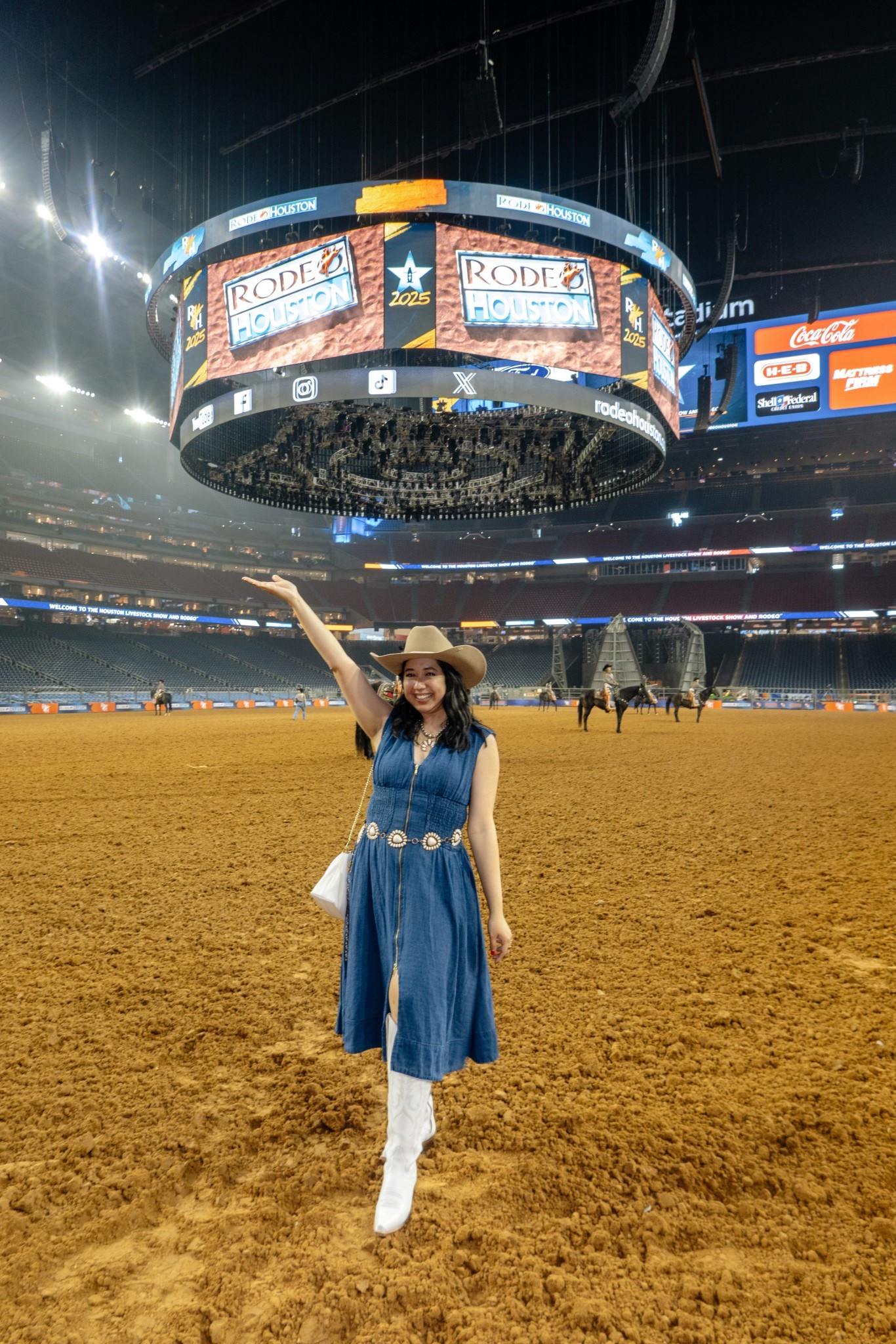 Rodeo cowgirl outfit. denim dress and white cowboy boots 

#LTKSeasonal #LTKFestival #LTKPetite