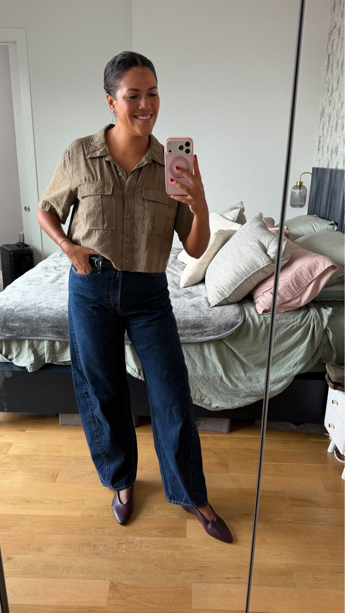 Casual office outfit for a fall day! Cropped army green blouse worn over high-waisted barrel leg jeans and completed the look with pointy-toed burgundy flats with a high vamp (aka more foot coverage than a typical ballet flat). I added a barn jacket and my fave Madewell office bag before heading out the door. 

Shirt, Darling, size L (TTS, but old! Linked similar)
Jeans, Gap, size 30T (TTS)
Shoes, Steve Madden, size 10 (run a little big)
Belt and earrings, Madewell (belt is a size L, TTS)
Bracelet, Alexandra Beth

#LTKootd #LTKMidsize #LTKWorkwear