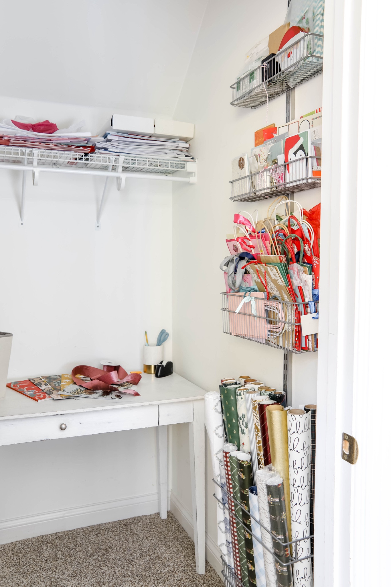 I cleaned out my guest bedroom closet to get it ready for my gift wrapping station! The organizer in the wall is perfect for keeping my wrapping paper, gift bags and gift tags all organized! 

These organizers can also be installed on the door, which is how I used it for years. And when I bought mine I had to piece it together. Now they have lots already made for specific uses! Love these!!

#LTKHome #LTKGiftGuide #LTKHoliday