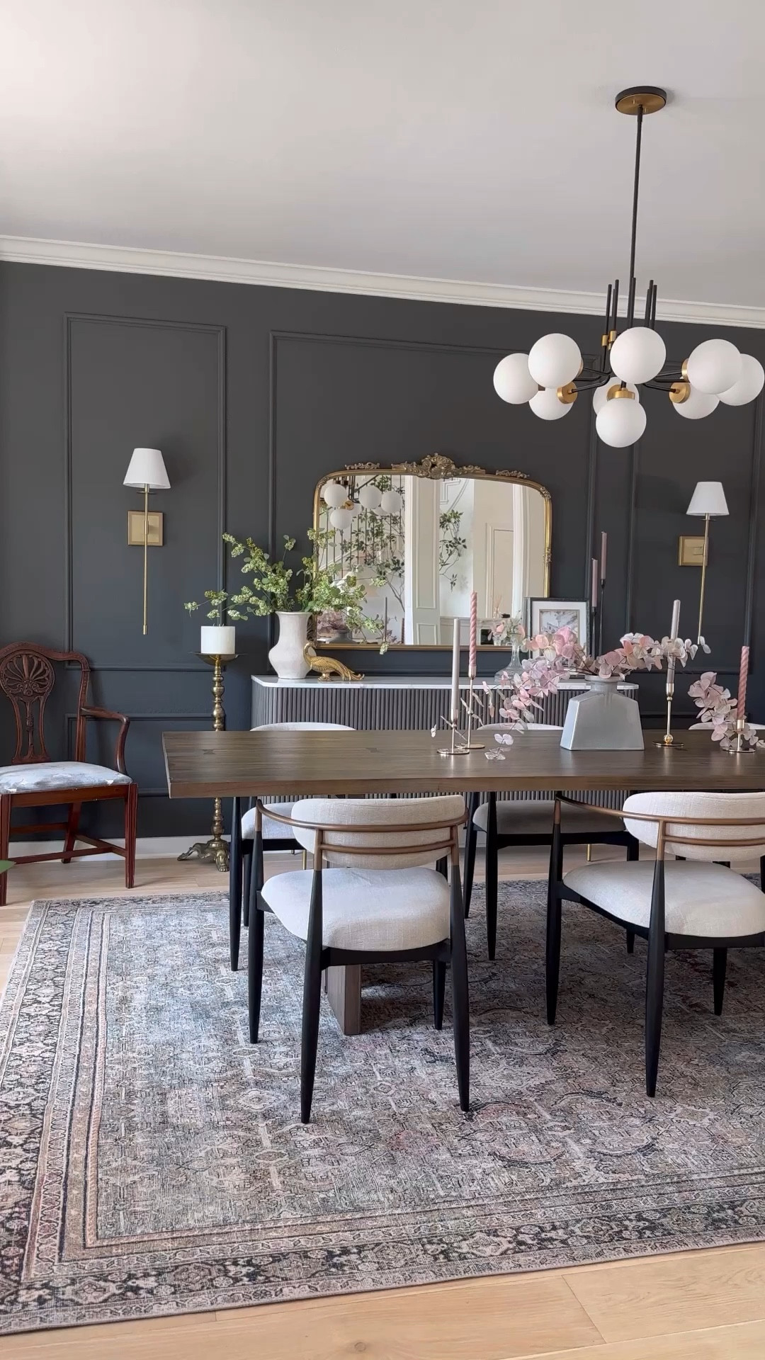 Dining room on sale! Arhaus Jagger dining chairs, Finnley fluted sideboard, buffet, and Loloi rug. Also included is the long wood dining table, chandelier, gold ornate wall mirror, sconces 