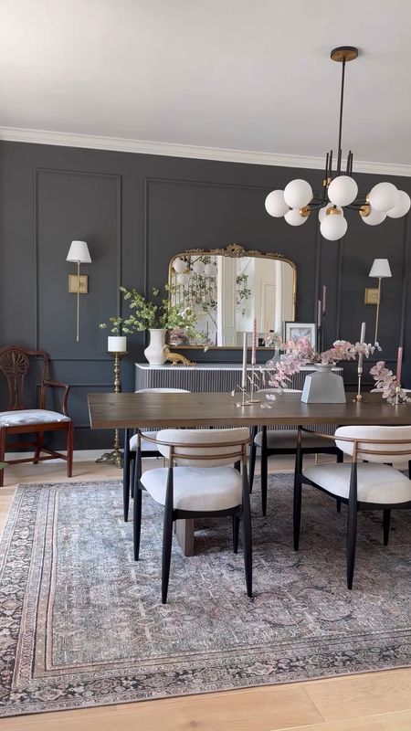 Dining room on sale! Arhaus Jagger dining chairs, Finnley fluted sideboard, buffet, and Loloi rug. Also included is the long wood dining table, chandelier, gold ornate wall mirror, sconces 