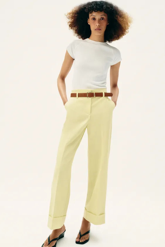 High-waist trousers with a belt. Featuring front pockets and false rear welt pockets. Straight le... | Zara UK