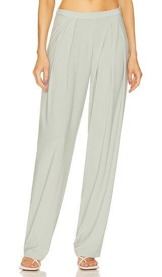 Norma Kamali Tapered Pleated Trouser in Sage. - size L (also in M, S, XL, XS) | Revolve Clothing (Global)