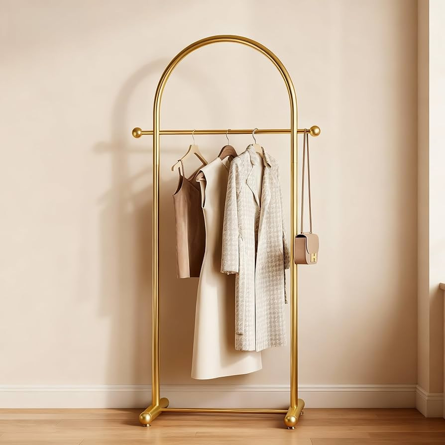 Modern Gold Arch Clothing Rack \u2013 Freestanding Metal Garment Rack for Bedroom, Closet, or Bou... | Amazon (US)
