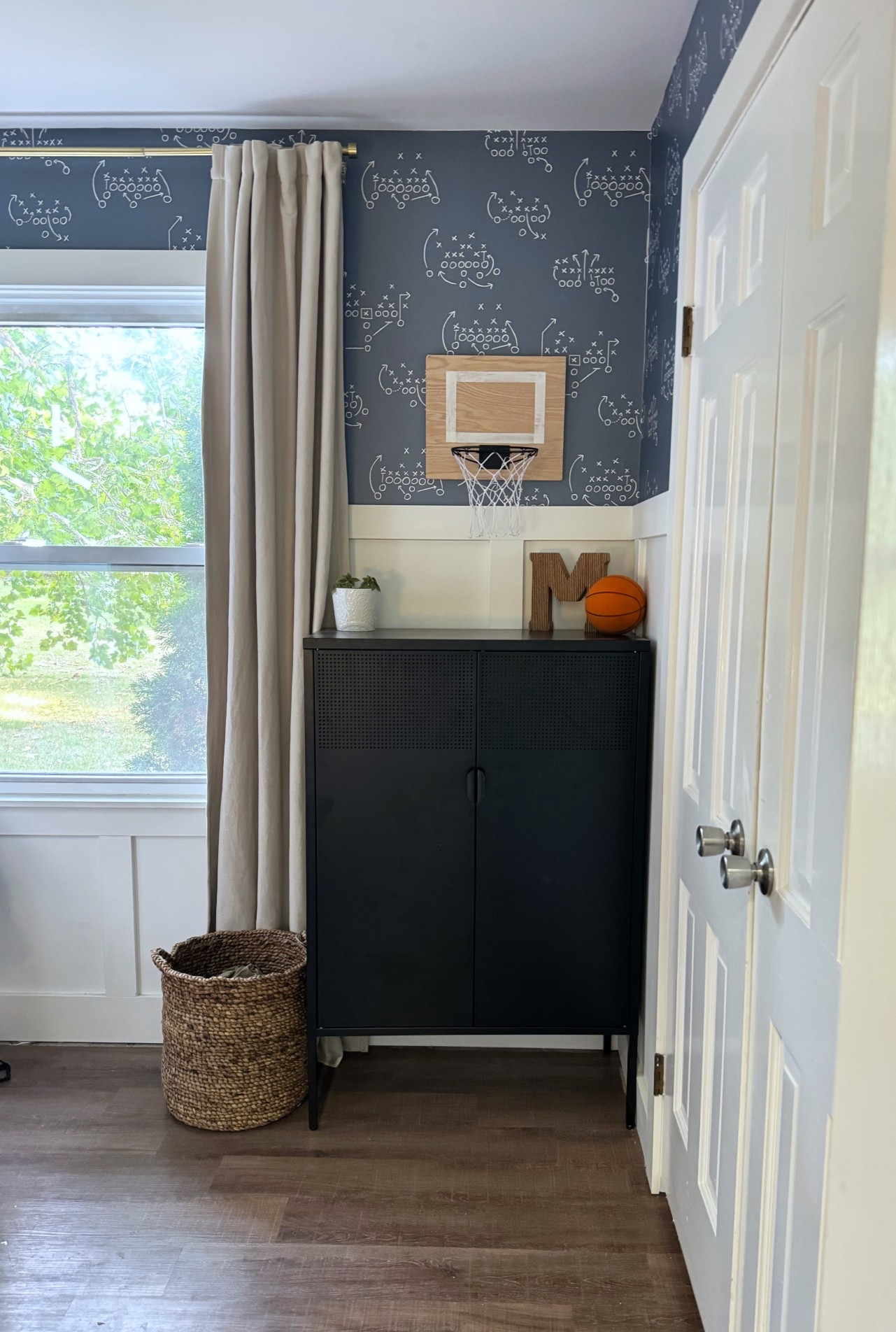 Sports themed bedroom! Wall paper is Love vs. Design. 

#LTKHome