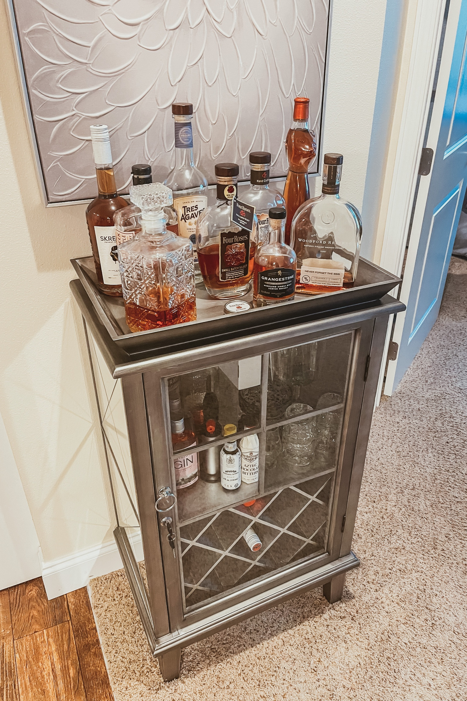 Mini bar is the perfect stylish addition. Grey with mirrors on each side. Added this gorgeous crystal glass decanter and glass set! @cshepherdifbb 

#LTKhome #LTKstyletip #LTKunder100