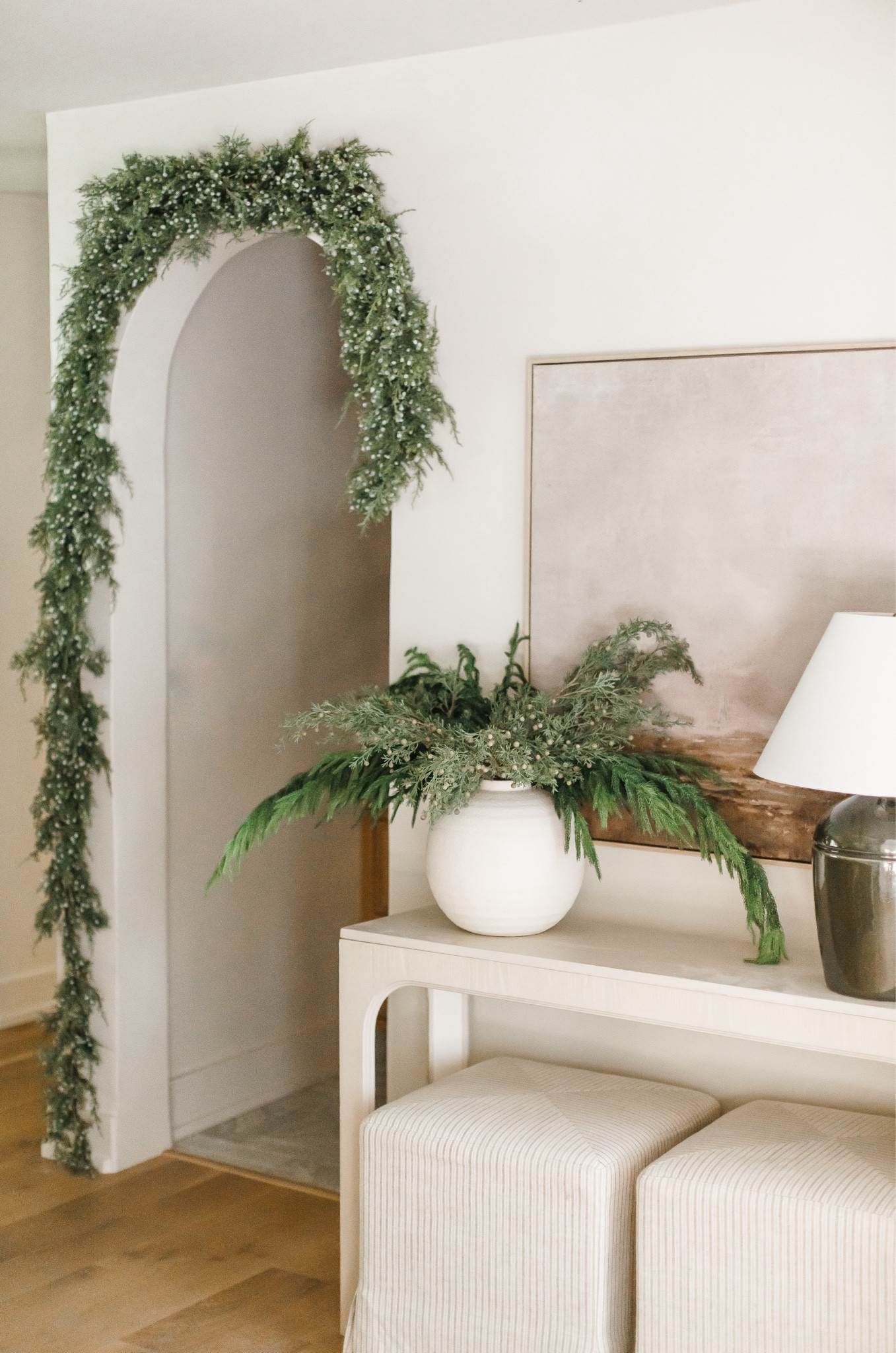 Can an arched doorway be any prettier? Yes. The answer is YES thanks to @afloral and their lifelike greenery, garland, and stems. I love that I can keep this up all winter long! 

Here's what I used: 
6 Oregon Juniper Garland around the arch 
1 Cedar Mantle Swag on the shelf 
3 Real touch Norfolk Pine Branches &
5 Cypress Branches for the arrangement 

@#afloral #homedecor #interiordesigner #homestyling #luxuryliving

#LTKHome #LTKSeasonal #LTKHoliday
