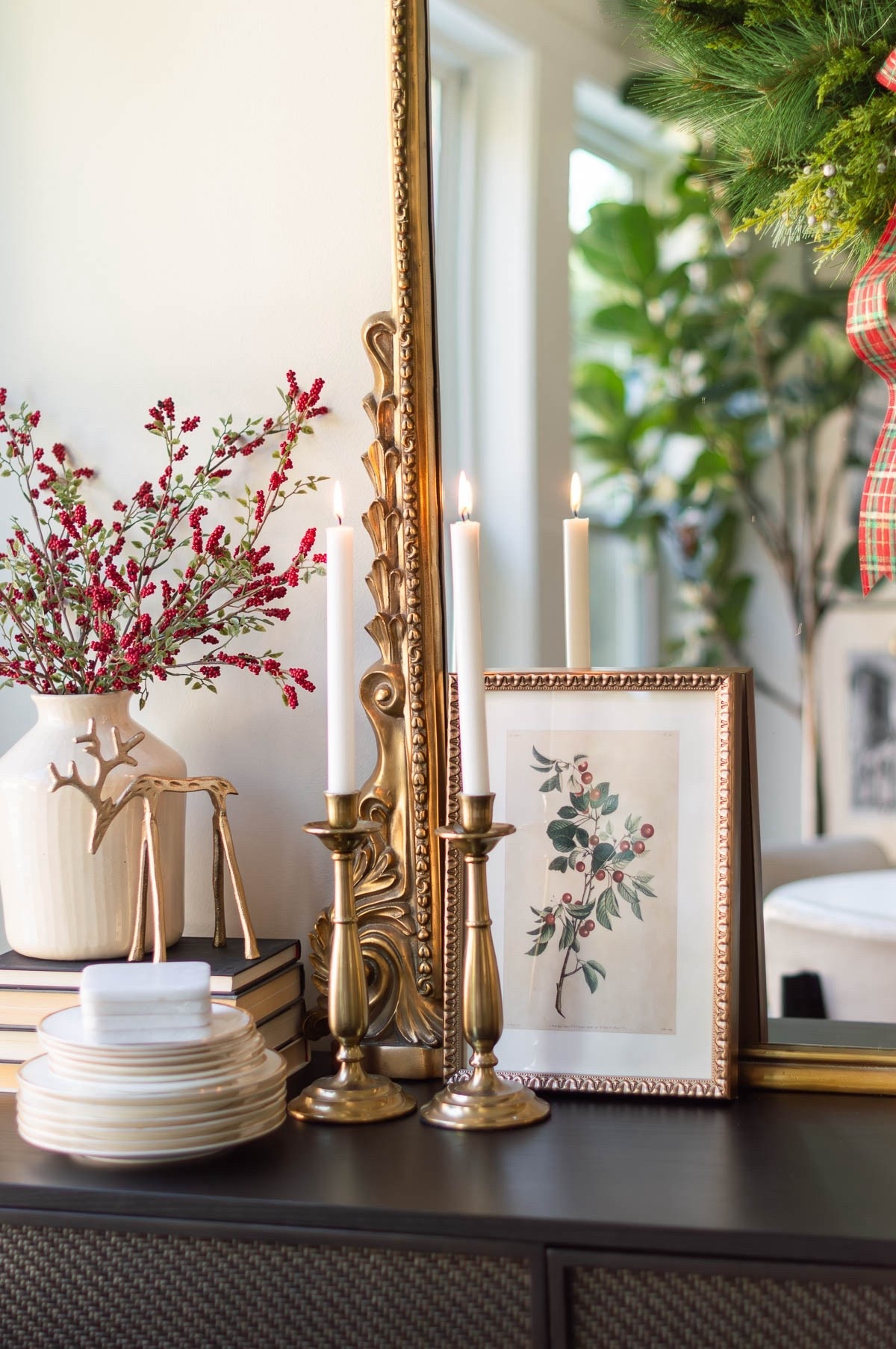 The gold and red berries pull this little holiday vignette together on my breakfast nook sideboard. The cute framed print is the only new accent I purchased this year. home decor Christmas decor dining room decor Christmas print primrose mirror 

#LTKFindsUnder50 #LTKHoliday #LTKHome