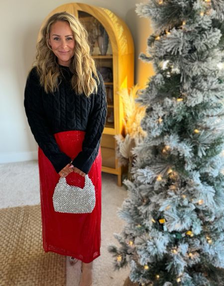 Holiday outfit from Target! 
Black knit sweater, red sequins skirt. Silver bag & a pair of clear heels with a super cute wreath detail 🎁

#LTKmidsize #LTKsalealert #LTKfindsunder50