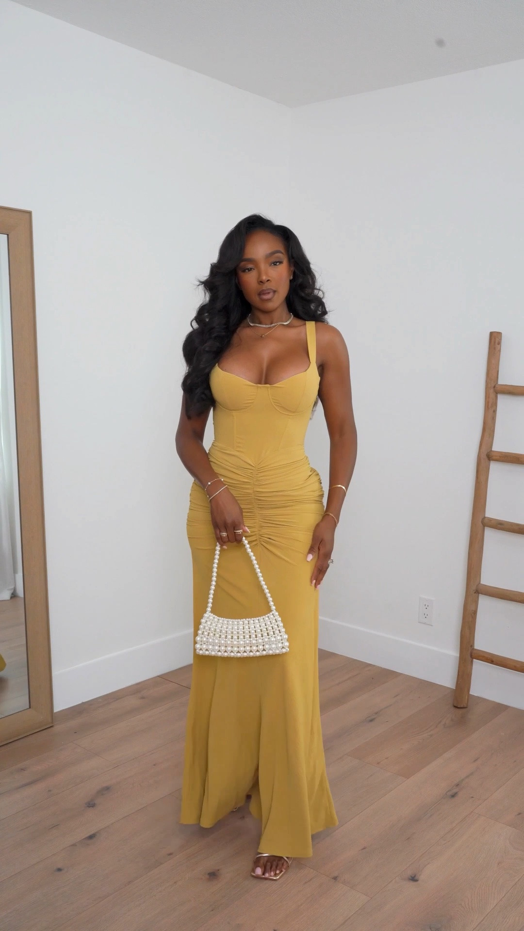 Hi Babes!

Okay this golden yellow dress is a SHOWSTOPPER. The ruched bodice hugs in all the right places while the flowy hem creates the most beautiful movement when you walk.

I am obsessed with this color for summer—it gives luxury vacation energy, photographs beautifully, and looks incredible paired with gold jewelry and a pearl bag. This is the kind of dress that gets compliments all night long.

Where to wear this:
• Summer weddings
• Vacation dinners
• Resort getaways
• Birthday celebrations
• Sunset cocktails

Undergarments: Strapless bra or breast tape recommended for the most seamless look (linked).

Everything is linked below!

xx Kira | IG: KirasFashionFinds

34D - 27 - 40 • Size Small or 4