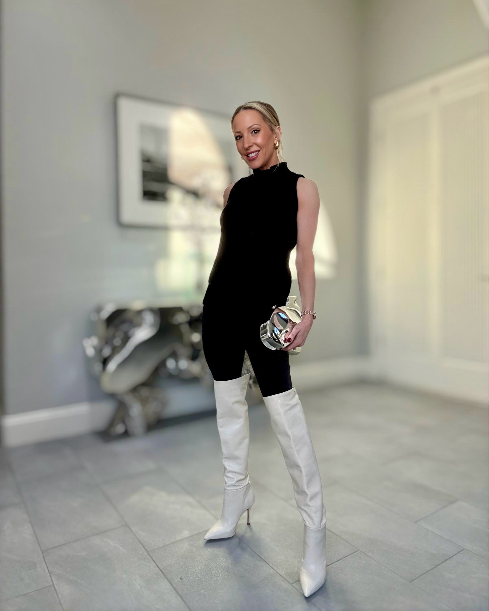 These thigh high boots keep me on my toes with styling as they definitely take some thought but I love them 🤍 Full review of both the boots and bag on my YouTube: evedawes.

Thigh high boots outfit idea: black leggings, black turtleneck sweater, over the knee boots and a silver cult Gaia clutch inspired style from Amazon! 

#amazonfinds #amazonfashion #overthekneeboots #larroude #thighhighboots

#LTKFindsUnder50 #LTKStyleTip #LTKHoliday