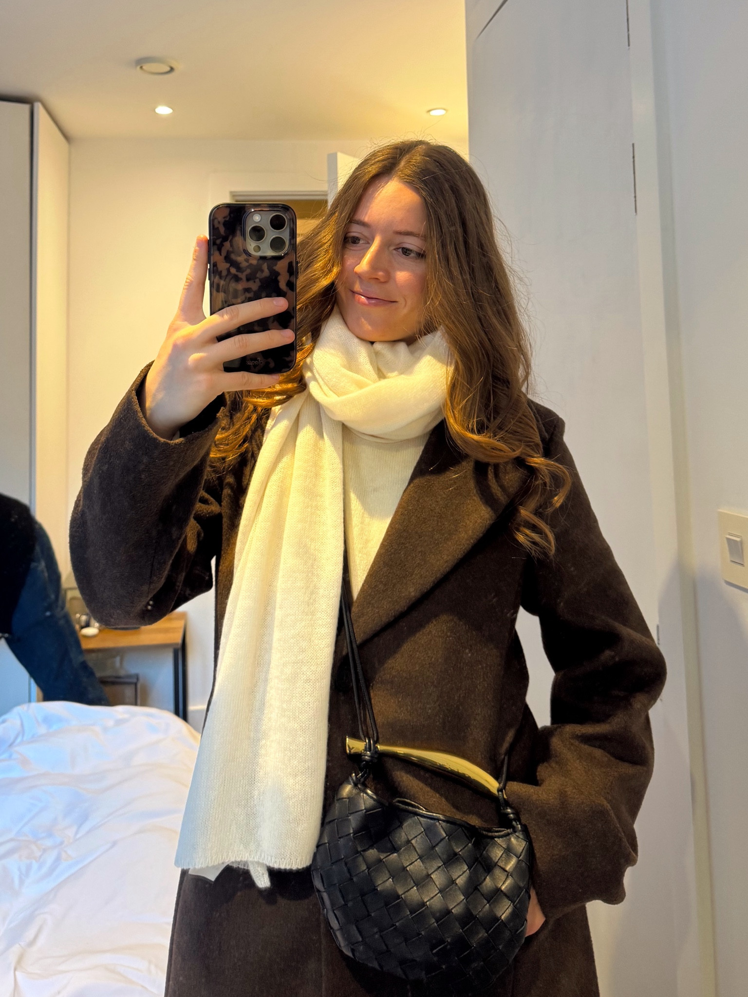 Winter outfit✨ Brown Hollister coat + Club Monaco white scarf + Sonix phone case + Bottega Veneta mini purse✨ 

#LTKSeasonal #LTKItBag #LTKStyleTip