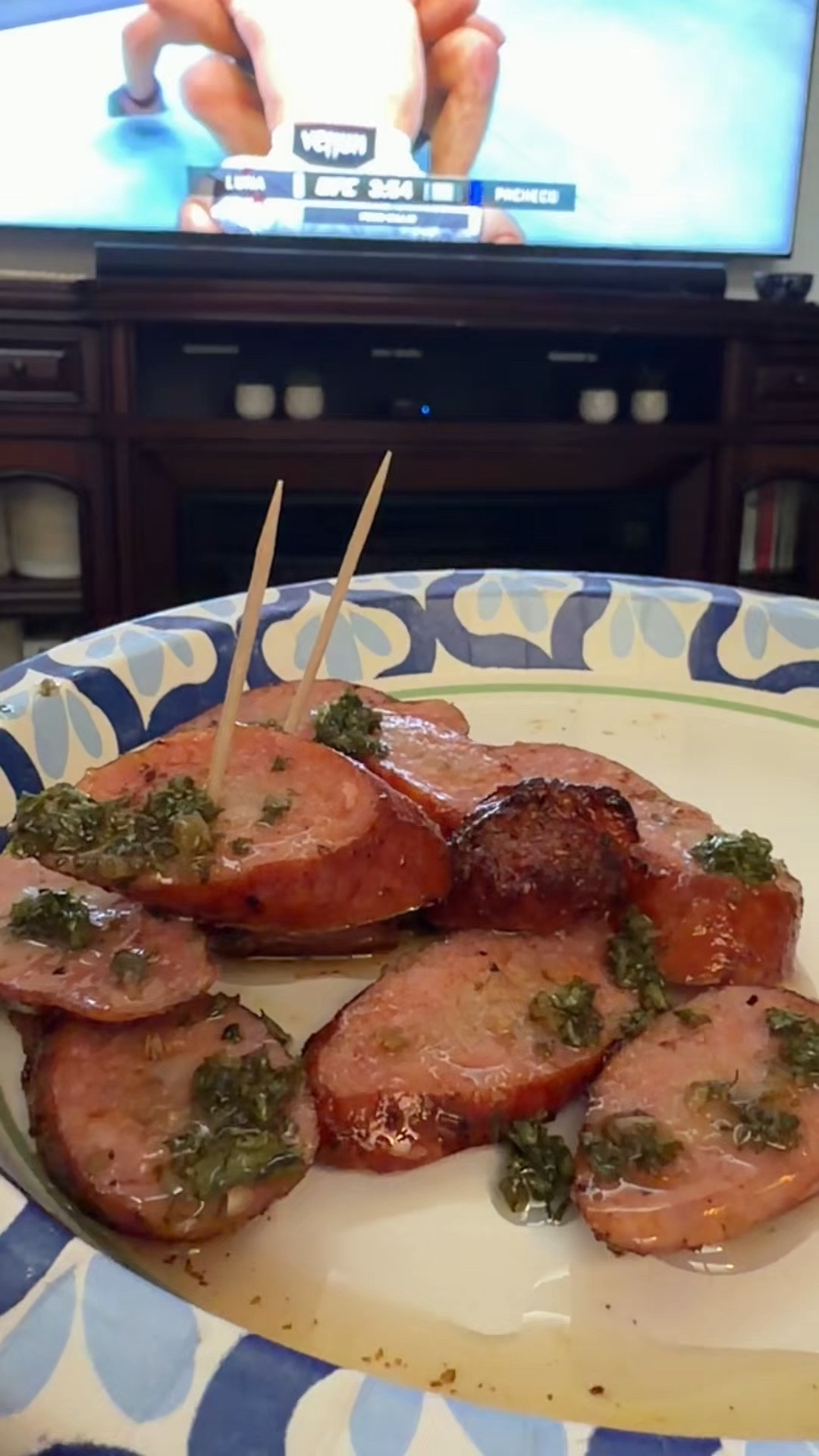 Homemade chimichurri with smoked sausage as we wait for dinner watching UFC with my medicube eye patches which by the way are so good! 

#LTKfoodie #LTKHome #LTKdayinmylife