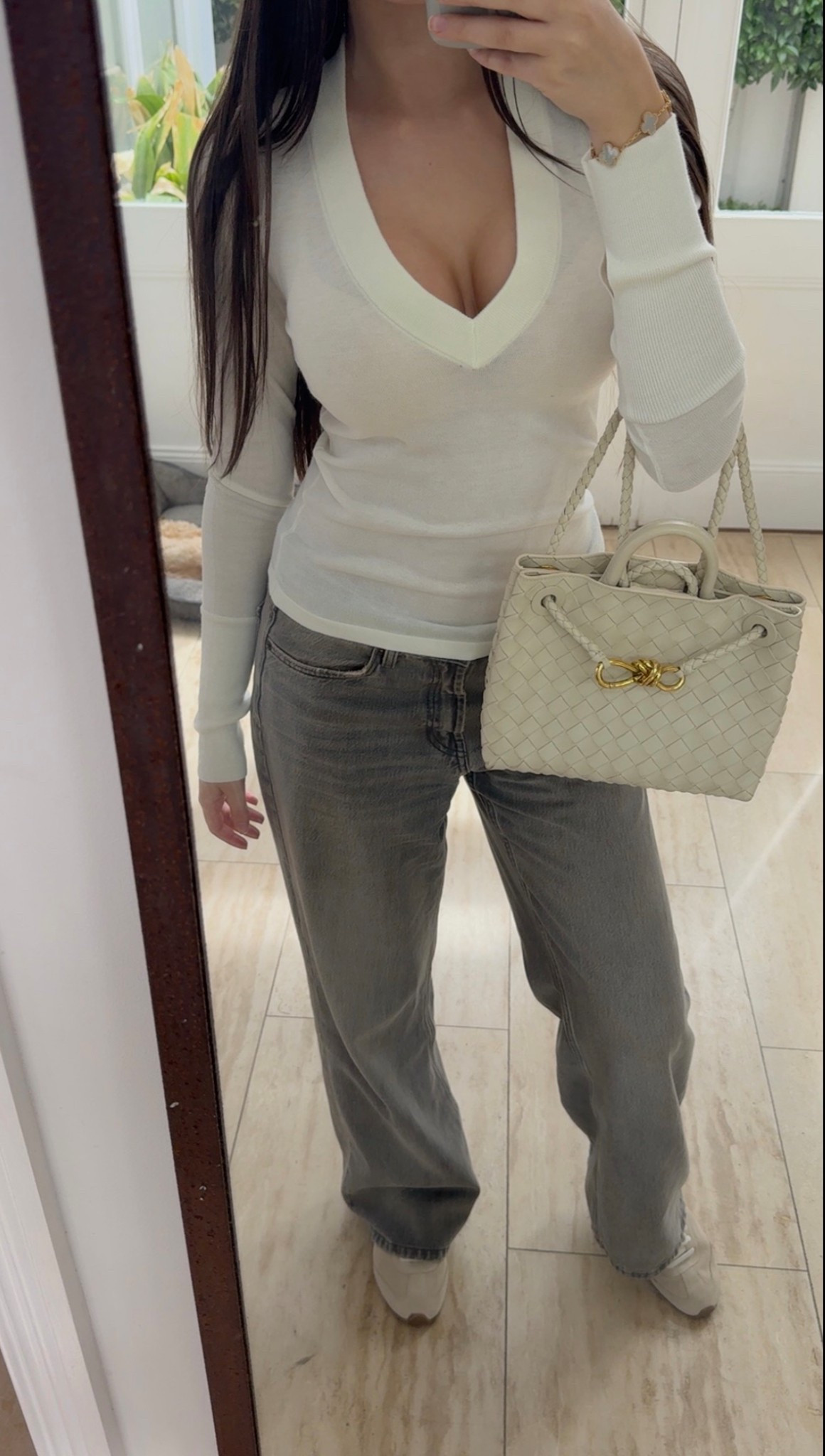 Running errands outfit 
Top: hence
Jeans: Zara
Shoes: Alo
Bag: Bottega

#LTKFashionMonth #LTKspring #LTKjeans