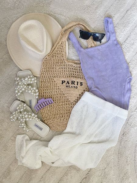 FASHION \ summer swim outfit 

One piece swimsuit
Amazon bag
Straw hat 
Mom fit 

#LTKStyleTip #LTKSeasonal #LTKFindsUnder50