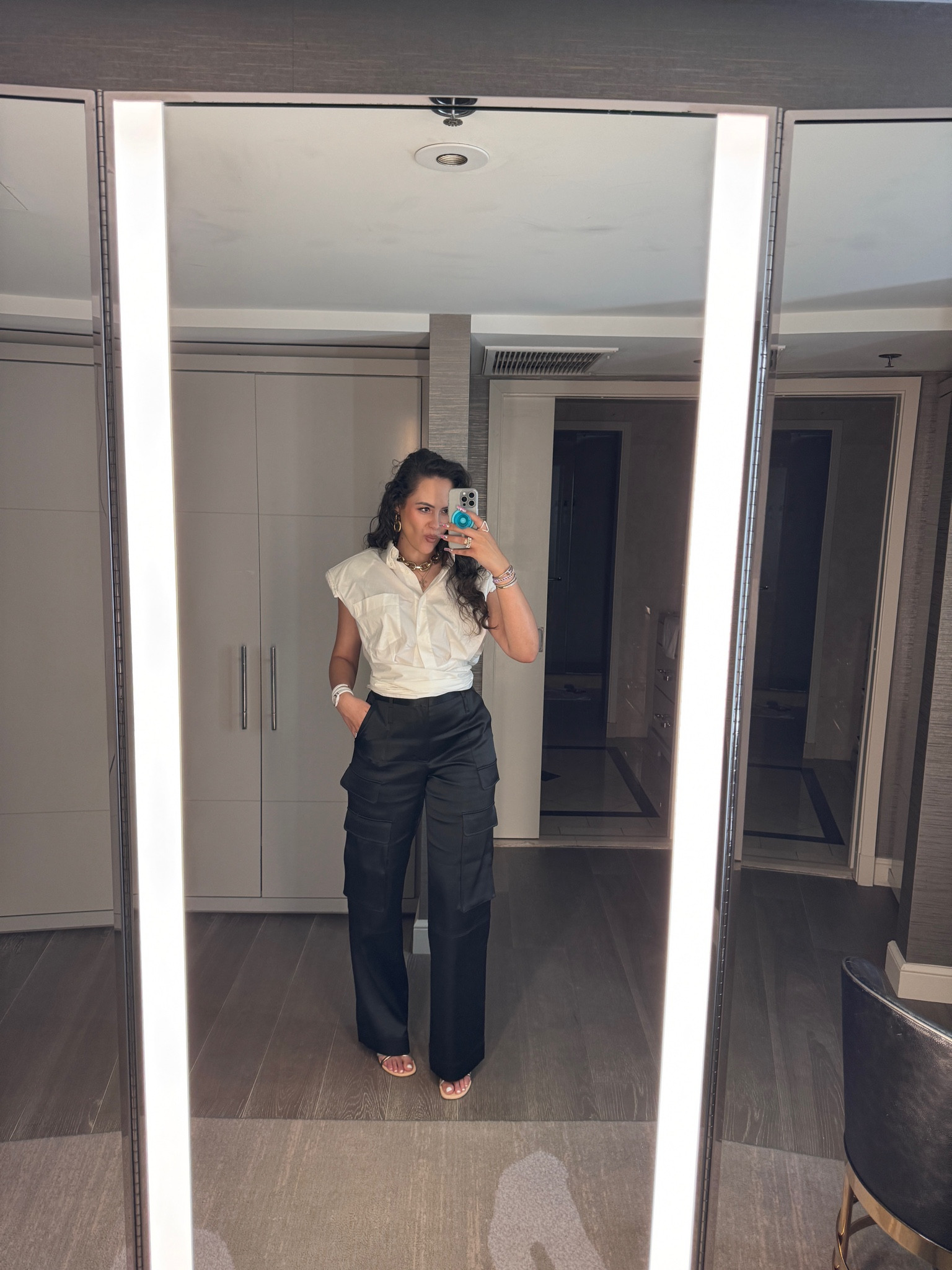 White shirt, black cargo trousers, heels, gold chain necklace, earrings

#LTKeurope #LTKstyletip #LTKSeasonal