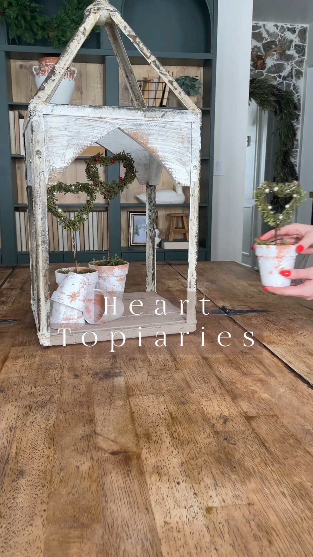 Valentines Day Heart Topiaries 🤍🌿

Re-sharing these cute little heart topiaries I did last year! So easy and cute! Used a wood skewer for the base stick and hot glued it into the foam base! Love using terracotta planters for crafts! Then I used greenery to cover the heart wreath and added beads! So fun! 
I don’t decorate a lot for Valentine’s Day but I love these for a little touch! What do you think?! 
.
.
.
#diyhomeprojects #rusticfarmhouse #diyhomeimprovement #diyhomedecor #modernfarmhouse #neutralhomeedit #amazonfinds #mystyleoffarmhouse #diycrafts #valentinesday #diyvalentinesdecor #valentinesdecor #homesweethome #cottagestyle