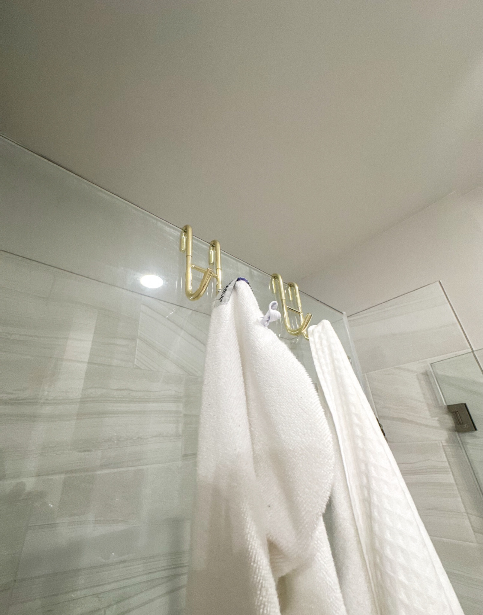 Short on wall space? Hook bath towels over a glass shower door instead! As a bonus, they’re easier to reach without even having to step outside of it!

#storage #organization

#LTKBeauty #LTKFamily #LTKHome