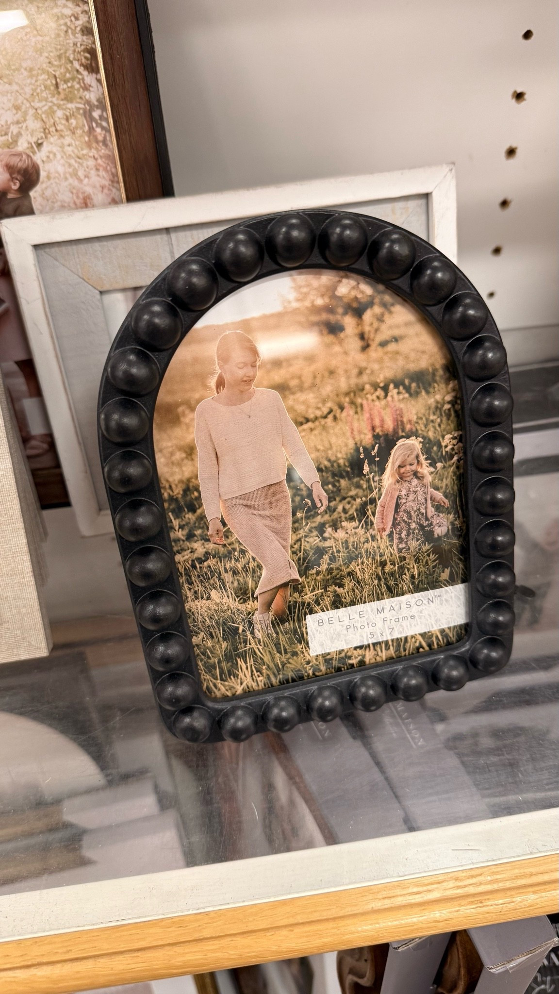 This frame stopped me in my tracks and it’s giving ALL the vibes 🖤✨ The beaded arch detail is so chic and it looks WAY more expensive than it is! A Belle Maison 5x7 photo frame that would look so good on a shelf, a nightstand, a gallery wall — honestly anywhere 😍 Perfect for displaying your favorite family photos, a wedding pic, or just that one gorgeous shot you’ve been waiting to frame!

#PhotoFrame #BeadedFrame #ArchFrame #BelleMaison #HomeDecor #HomeDecorFinds #ShelfDecor #GalleryWall #HomeDecorInspo #AffordableHome #OrganicModern #CoastalBoho

black beaded arch photo frame, Belle Maison photo frame, 5x7 arch frame, beaded picture frame, organic modern home decor, arched photo frame black, boho picture frame, affordable home decor frame, shelf decor frame, gallery wall frame