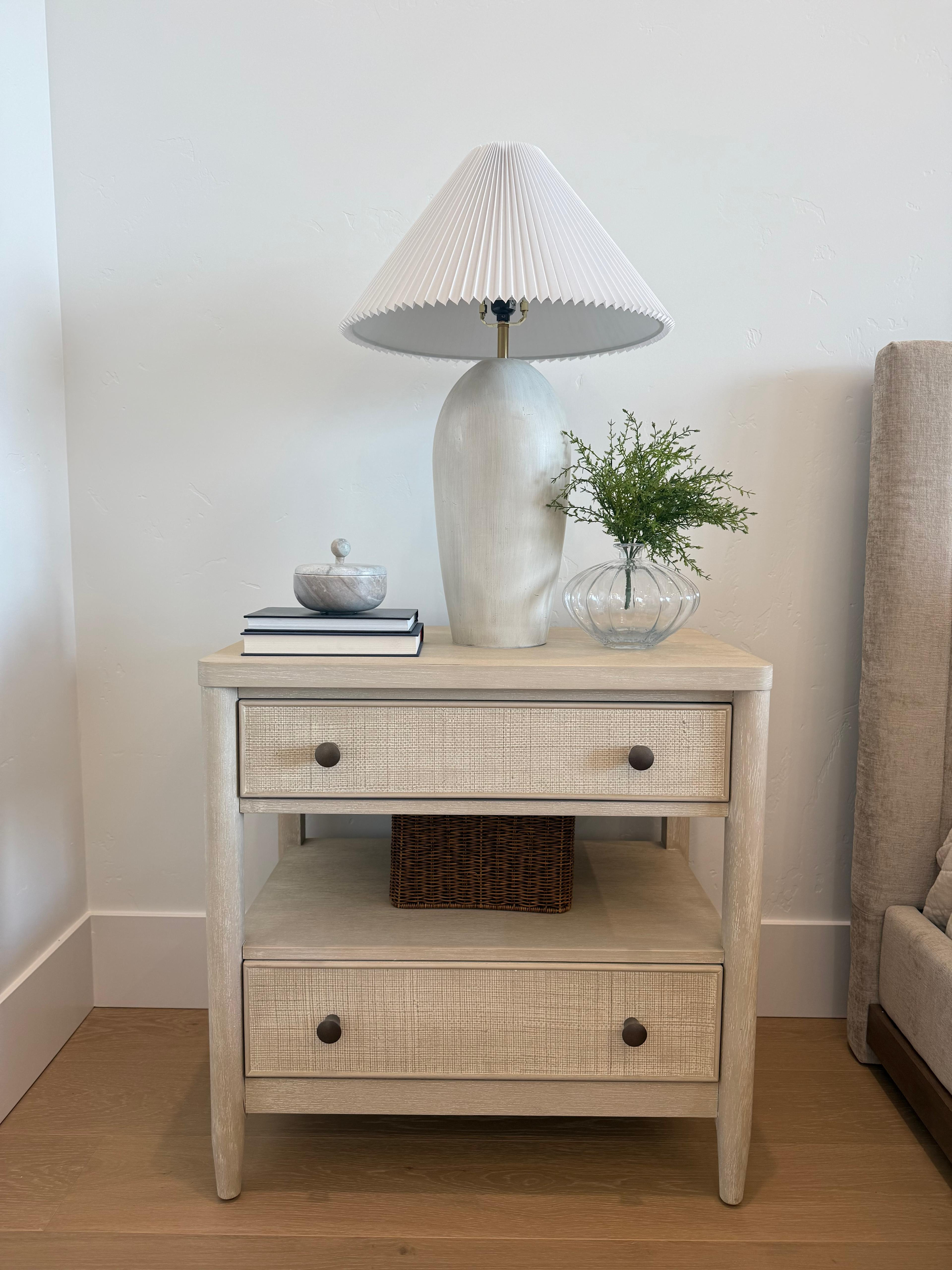 I styled this nightstand with pieces I reach for often, a mix of texture, warm neutrals, and soft lighting.

I like how the woven drawer detail and ceramic lamp keep it simple but layered, creating a calm bedside setup that feels both functional and finished.
 @Wayfair 


#LTKSaleAlert #LTKHome #LTKU