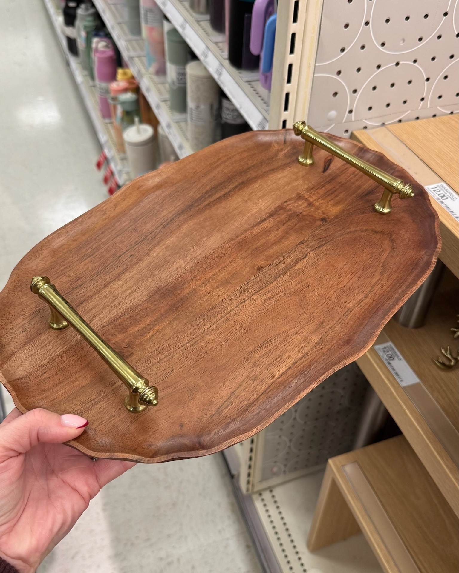 How cute is this wood serving tray! I love the gold hardware. Only $22!! Would be such a great gift paired with a dish towel, soap, or candle! 

#LTKHome #LTKHoliday #LTKGiftGuide