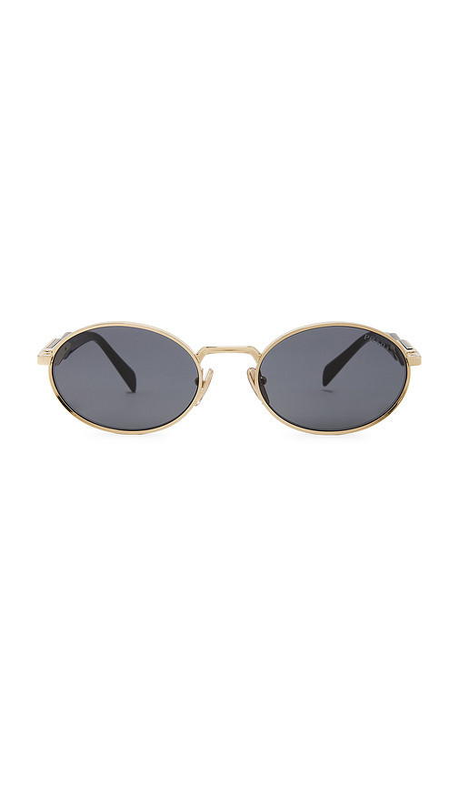 Prada Oval Sunglasses in Metallic Gold. | Revolve Clothing (Global)