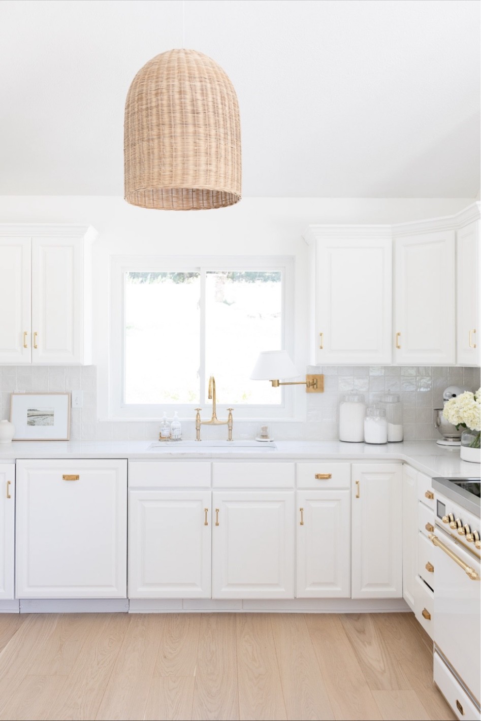  kitchen hardware and decor with Rejuvenation brass drawer and bin pulls, Serena & Lily pendant, glass jars, art, brass faucet, vase and sconce lamp. Kitchen decor, kitchen brass hardware, kitchen hardware, kitchen inspo, kitchen inspiration, kitchen decoration, kitchen lighting.

#LTKstyletip #LTKSeasonal #LTKhome
