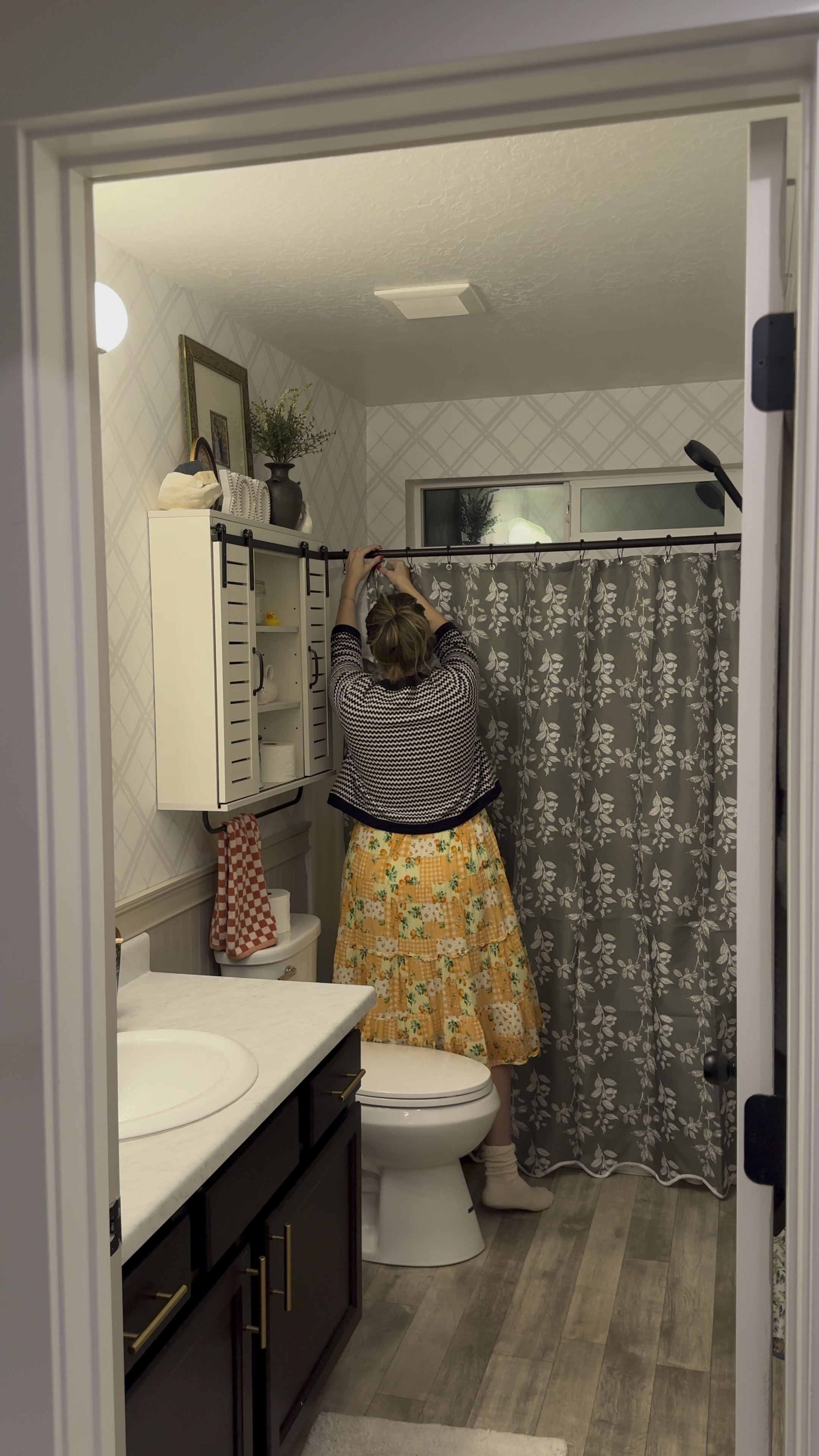 New shower curtain alert! I am in love with this simple yet impactful transformation. I’ve had this white shower curtain since before Kelly & I got
Married and it was time for it to retire. Absolutely love this green floral with the scalloped edge. It adds such a great pop of color and charm in this cutie bathroom. Plus it’s 50% off right now making it like $12!! 

#LTKFamily #LTKHome #LTKFindsUnder50