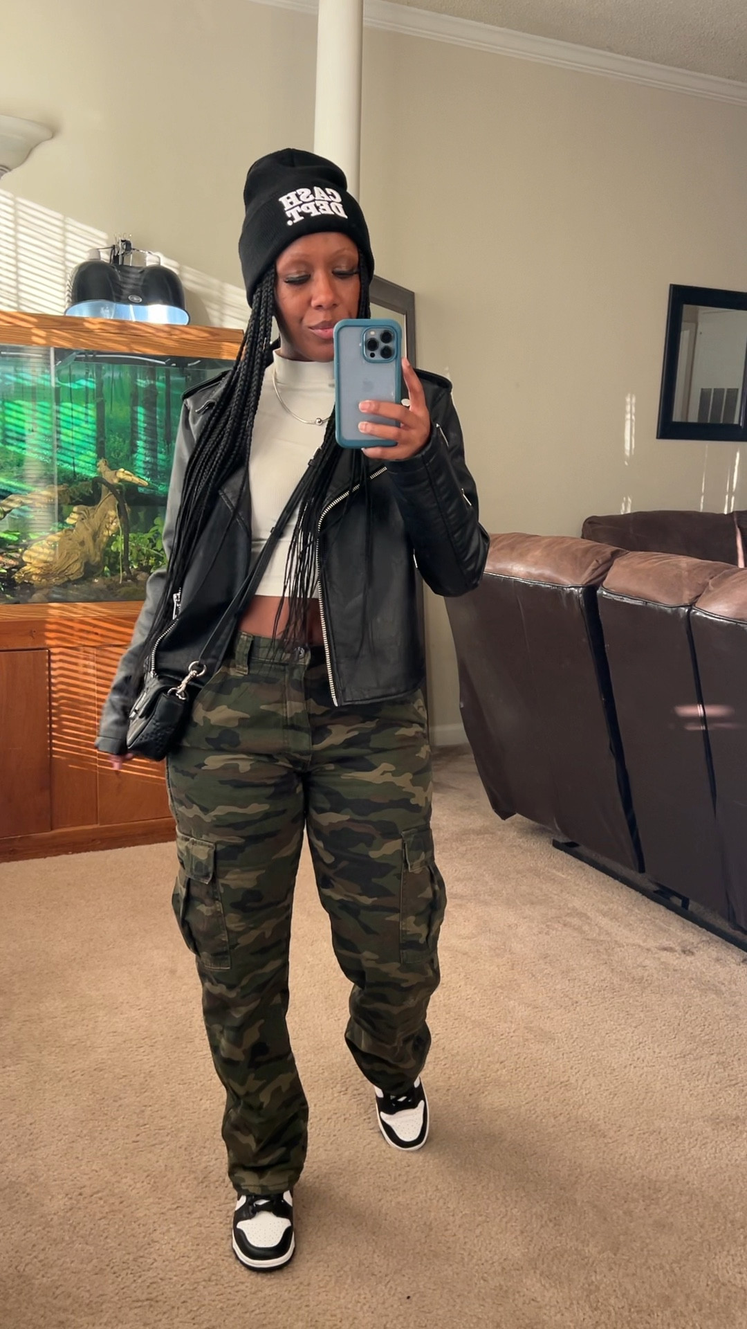 How to style camo cargo pants with black faux leather jacket, beige long sleeve crop top, black crossbody bag, and Nike dunk low pandas. I’m wearing a size small in shirt and jacket, size 29/30 in men’s.

#LTKstyletip #LTKSeasonal #LTKHoliday