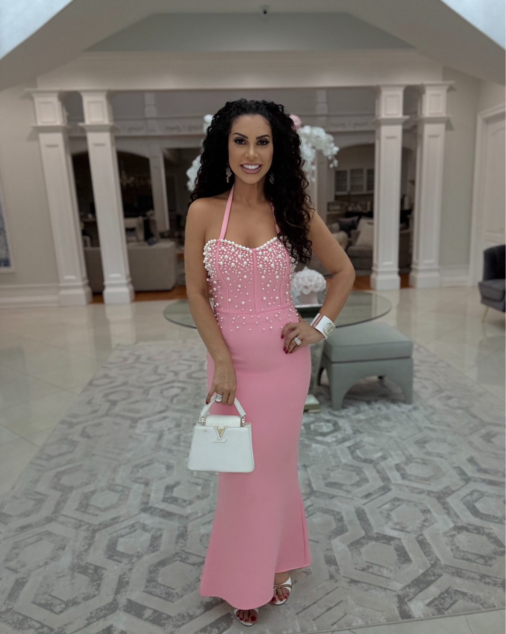 Pretty in pink. I purchased this dress in a size small for your reference. It has a great stretch, but it was super long so I had it shortened and I used the extra material to create a halter.. I love altering my clothes to make them feel custom to my style & my body.  My white with gold hardware accessories are not available to be linked so I picked fantastic alternatives. The YSL bag is available and white.