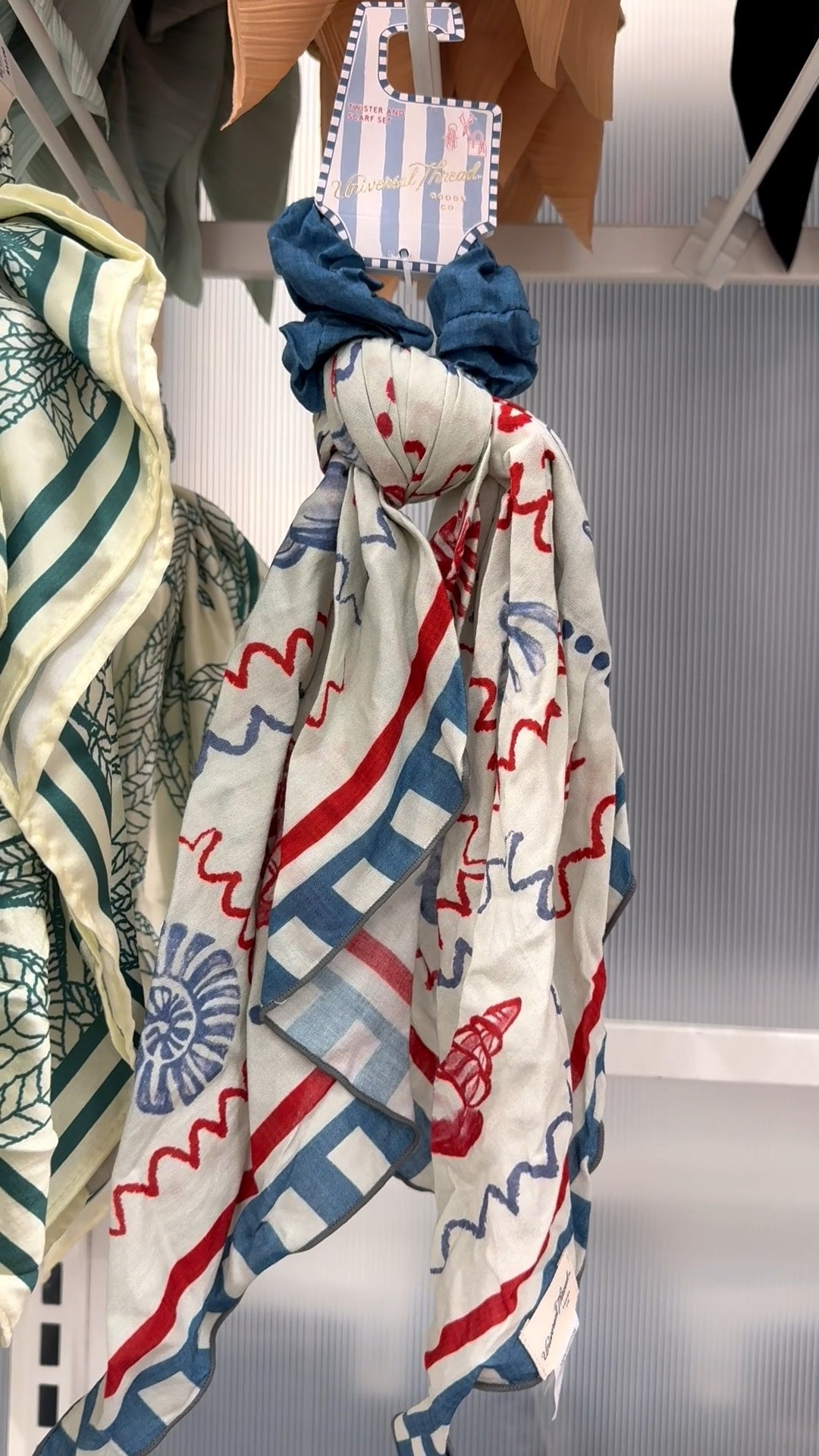 Be cute while staying cool with this sweet fabric hair tie with attached scarf combo. The silky fabric features a red, white, and blue shell print design. 

#hairtie #hairaccessories #ponytailholder #summerofficeoutfit #summervacationoitfit #target #oceantheme #beachoutfit #patrioticaccessories #shellprint

#LTKMidsize #LTKPlusSize #LTKPetite