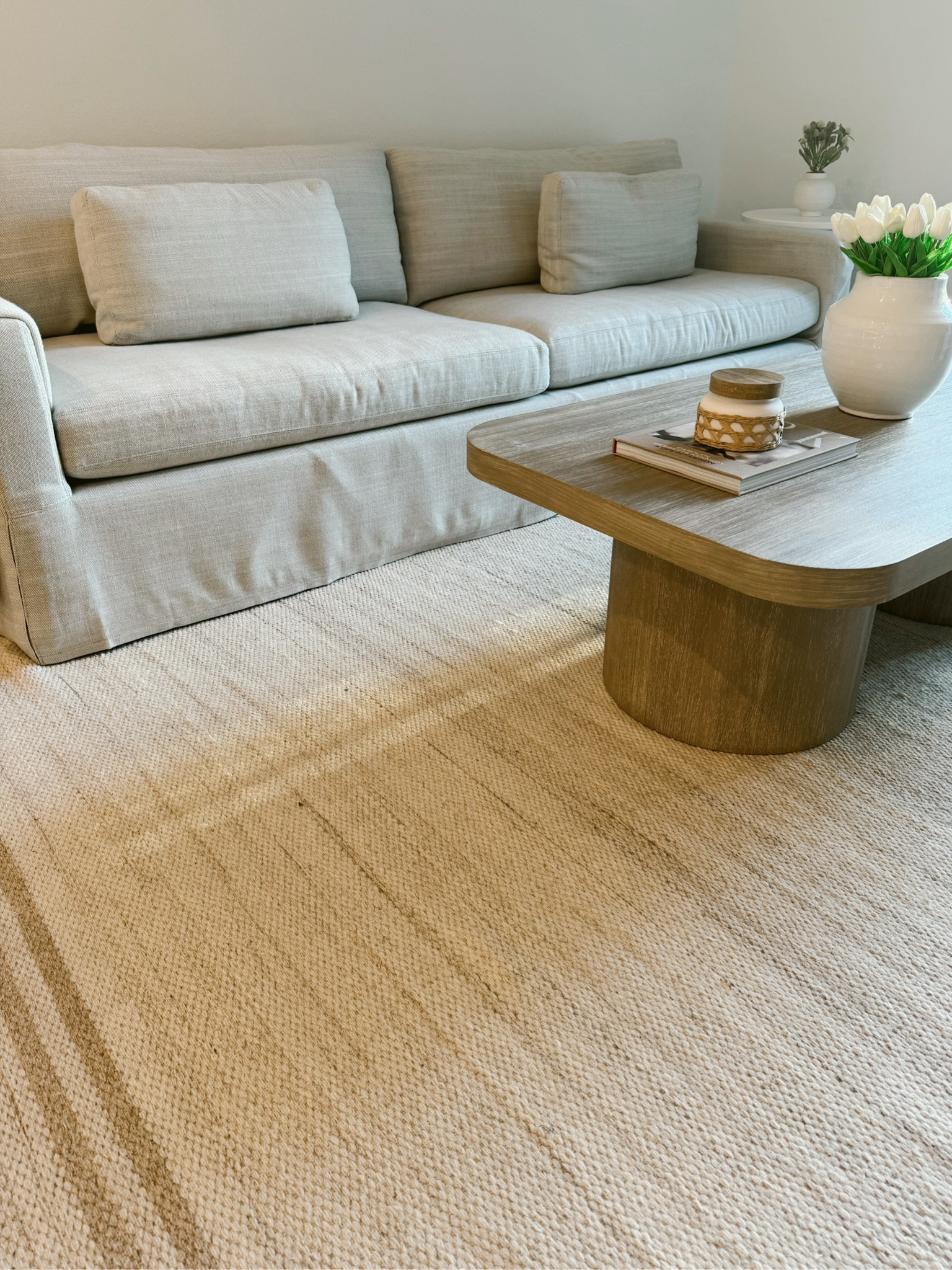 HOME 🤍 | My couch is the Restoration Hardware Belgian Track Arm Slipcover Sofa & I can’t link, BUT I linked a veryyyy similar couch at such a great price point!!! | Also! If you choose in-store pickup for World Market, you get 15% off the entire order — which is what I did when ordering my coffee & console table! 

#LTKFindsUnder100 #LTKHome #LTKStyleTip