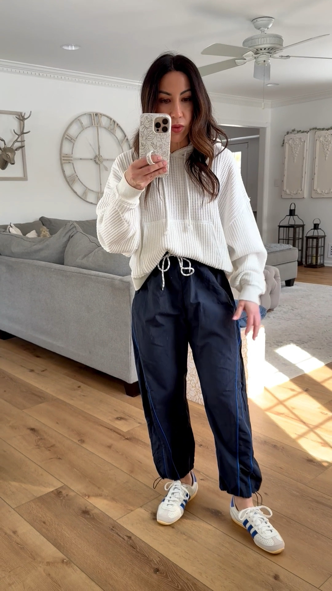 Adidas sneakers size down half. White hoodie small. Track pants small.

#LTKSaleAlert #LTKOver40 #LTKPetite