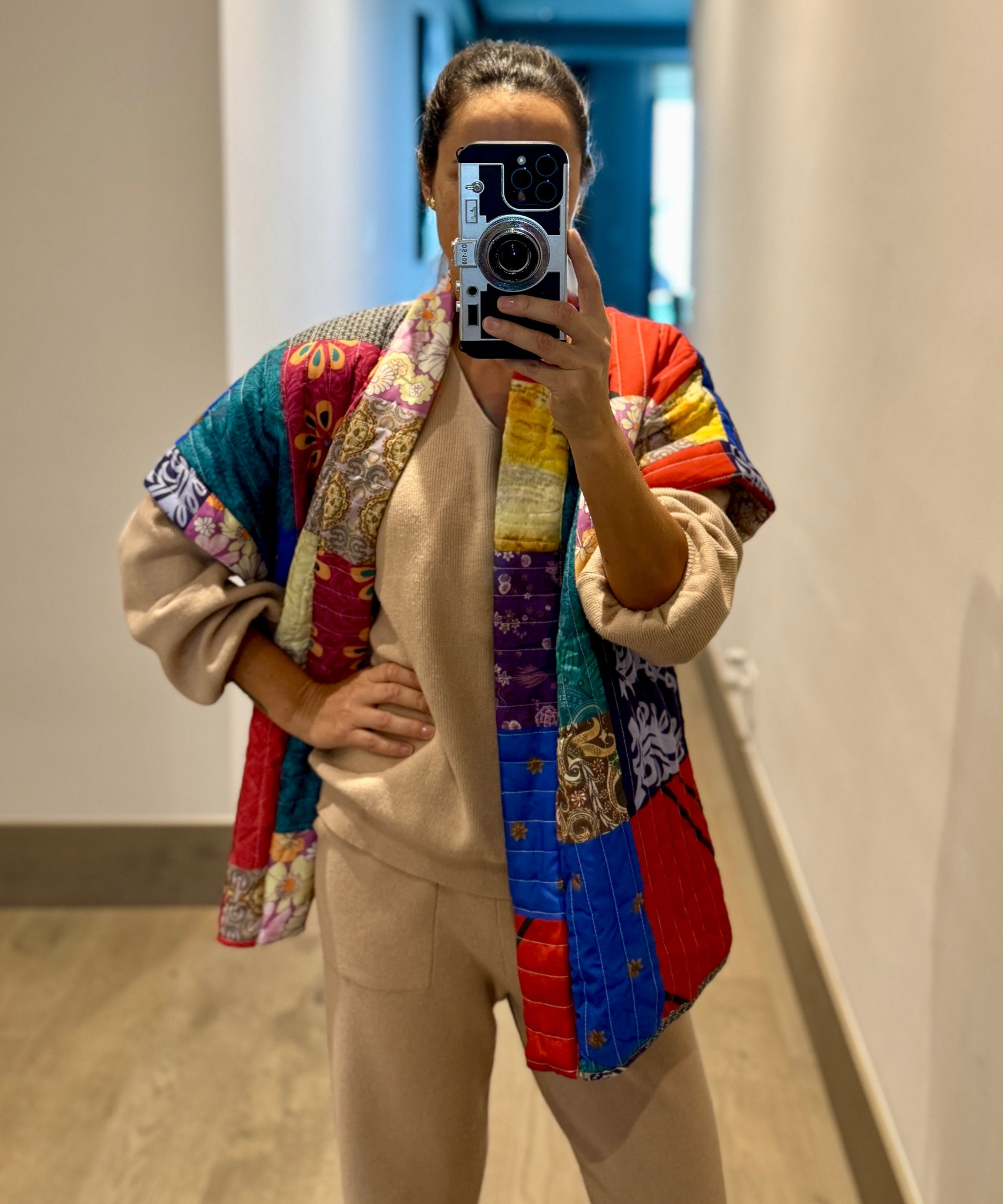 Love how versatile this vest is. It looks great over any outfit. 