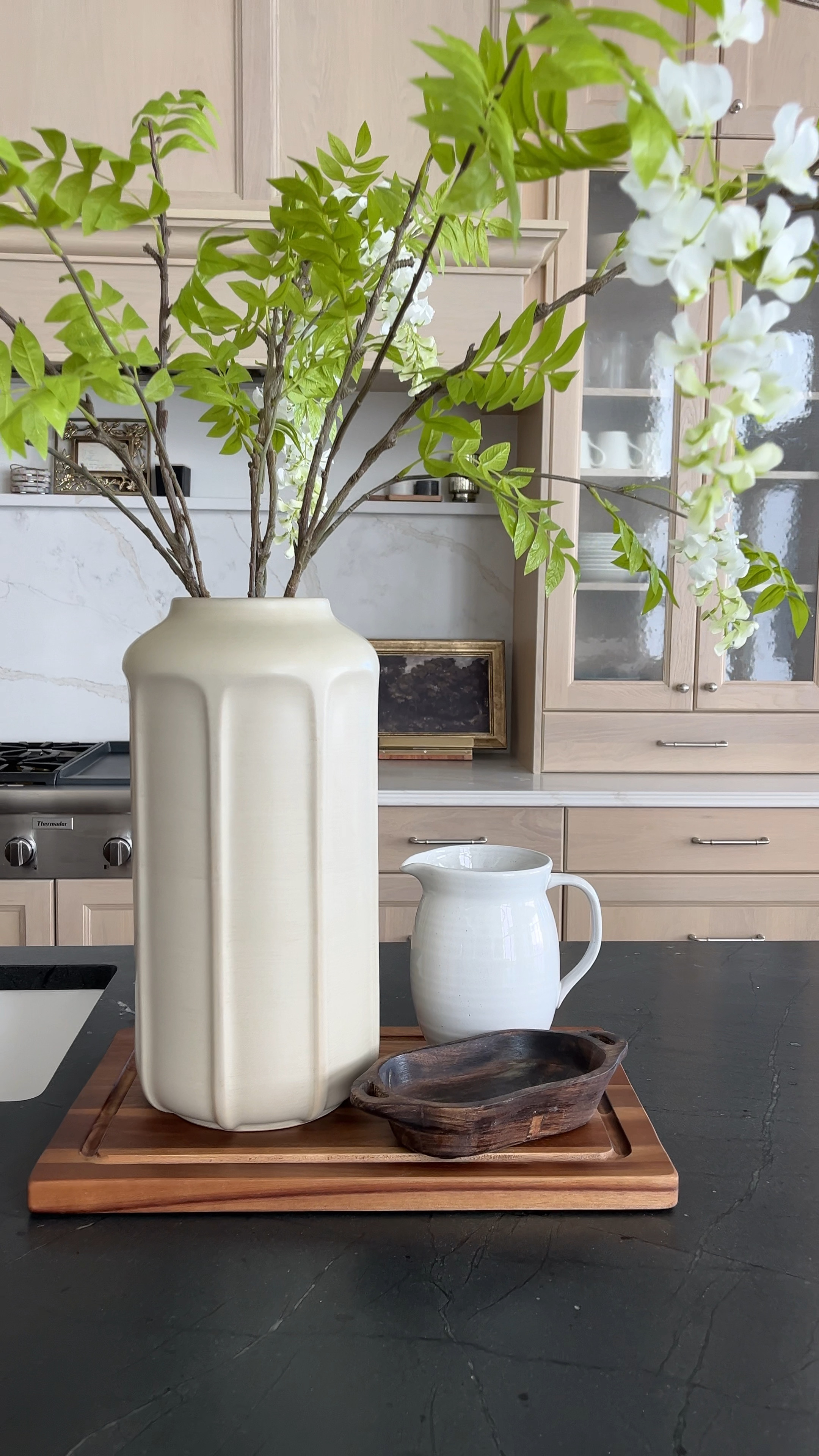 Kitchen decor Spring refresh

Keeping it simple with gorgeous large Spring floral wisteria stems, a tall vase, small pitcher, and mini dough bowl on a beautiful cutting board.

#springrefresh #springdecor #kitchendecor

Tall vase, dough bowl, white pitcher, Target home decor, New Target spring decor, cutting board, Walmart home decor, Amazon home decor, kitchen styling, affordable decor, look for less

#LTKSeasonal #LTKMostLoved #LTKhome