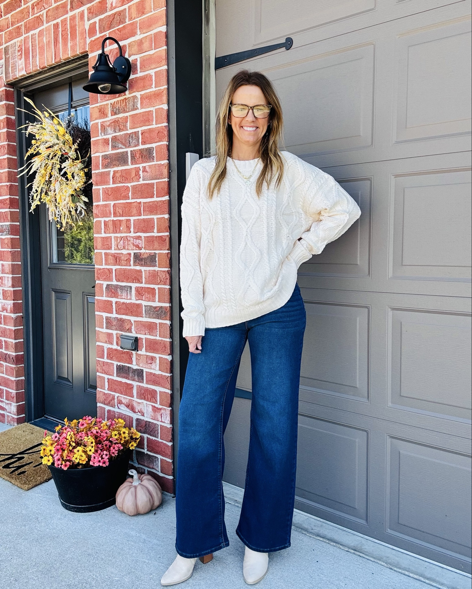Cozy + classic for fall 🍂✨

This chunky cable-knit sweater paired with wide-leg denim is giving all the effortless, comfy vibes — and I’m not mad about it. 🤍Finished it off with neutral booties because they literally go with everything. 

#falloutfit #cozyvibes #widelegdenim #sweaterweather #neutralstyle #ootdinspo #ltkfashion #ltkfall #amazonfinds