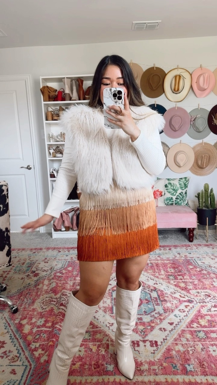 Chic Elegance Ivory Faux Fur Vest - wearing medium
Don't Be Complicated Light Clay Multi Fringe Skirt - wearing large

Fall outfit, fall fashion, fall style, fall look, cropped vest, faux fur vest, fringe skirt, mini skirt, holiday skirt, thanksgiving skirt, Christmas skirt, Holiday outfit, thanksgiving outfit, thanksgiving dress, thanksgiving style, thanksgiving fashion, thanksgiving look, fall family photos outfit, Christmas outfit, holiday style, Christmas style, holiday fashion, Christmas fashion, holiday look, Christmas look, holiday family photos outfit, holiday card outfit, Christmas card outfit, special occasion outfit, NYE outfit, NYE fashion, nye style, nye look, New Year’s Eve outfit, New Year’s Eve fashion, New Year’s Eve style, New Year’s Eve look, midsize fashion, midsize style, midsize outfit, midsize look, midsize blogger, midsize influencer 

#LTKfindsunder50 #LTKSeasonal #LTKmidsize