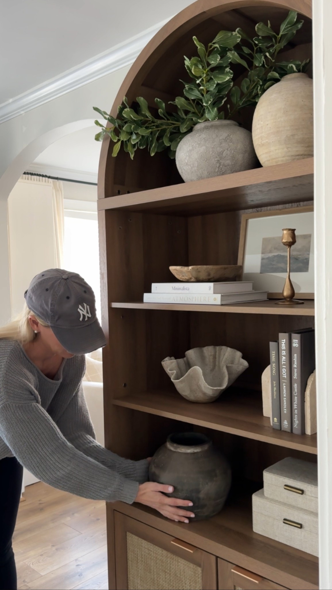 Shelf styling decor, arched cabinet, display cabinet, bookcase, curio cabinet, wood cabinet, neutral home decor 

#LTKStyleTip #LTKHome