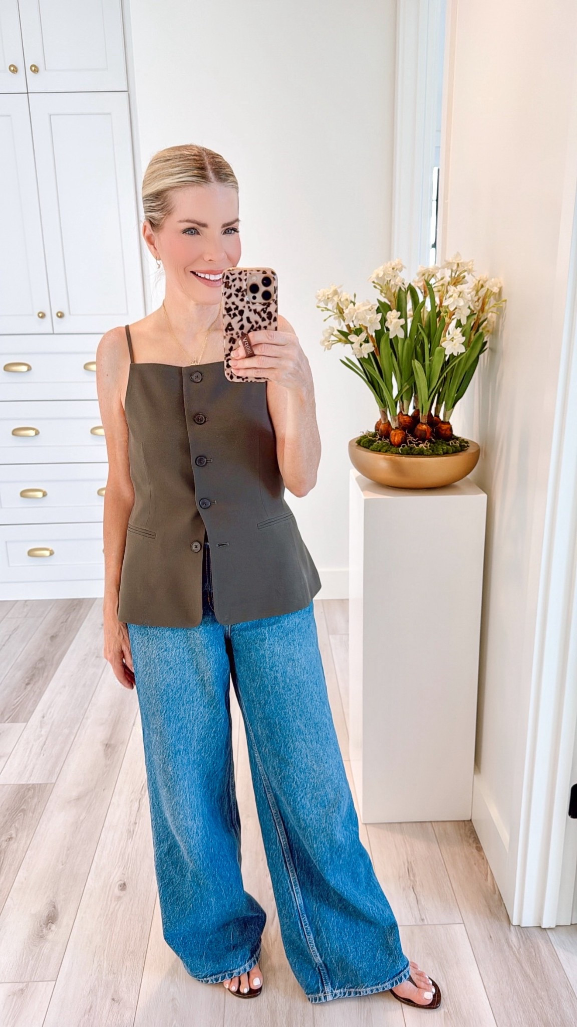 My top is on sale in the dark olive color for $46.99 - Final sale. Very few left. I have a size 6  
Wear with matching pants from Aritzia or jeans. It’s so stylish and up-levels every look. The black (which I also have) is on sale for $58. 

#LTKFindsUnder50 #LTKSaleAlert #LTKootd