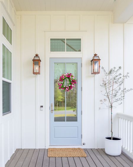Loving this pink tulip wreath on our front door for spring! It looks so cute paired with our copper gas lanterns, fluted planter and woven door mat.
.
#ltkhome #ltkfindsunder100 #ltkfindsunder50 #ltkstyletip #ltksalealert spring front porch decorating 

#LTKhome #LTKfindsunder100 #LTKSeasonal